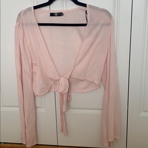 Light pink tie front top with bell sleeves
